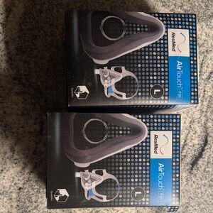 2 ResMed AirTouch F20 Mask with Black Frame and Blue Highlights